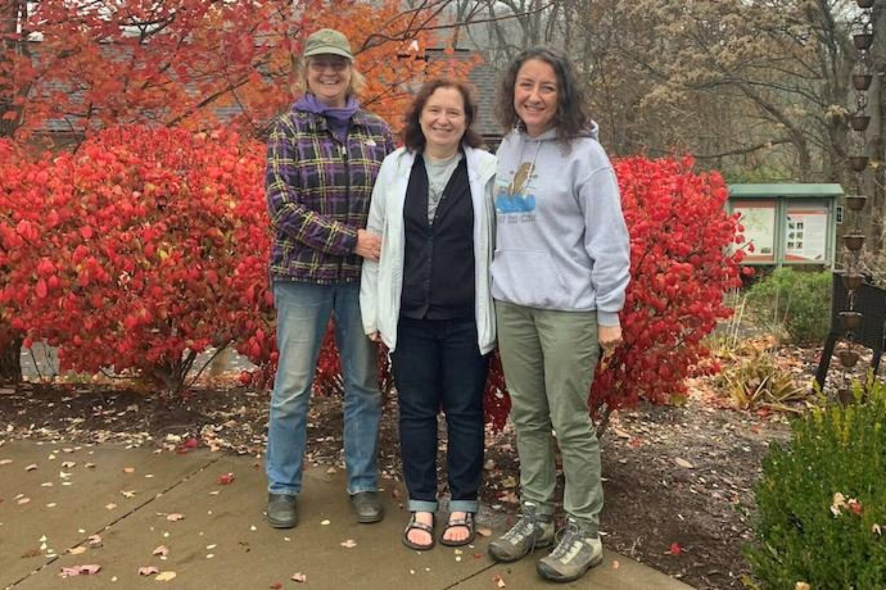 As part of the conference program, longtime West Virginia trail advocates Peggy Pings, Ella Belling and Amanda Pitzer celebrate Ella’s recognition as a leader of trail advocacy on the Mon River Rail-Trail System in Morgantown. | Photo courtesy Amanda Pitzer