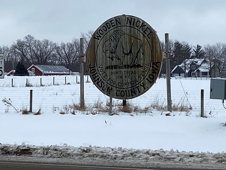 World's Largest Wooden Nickel along the Iowa River Corridor Trail in Iowa | Photo by Kevin Belanger