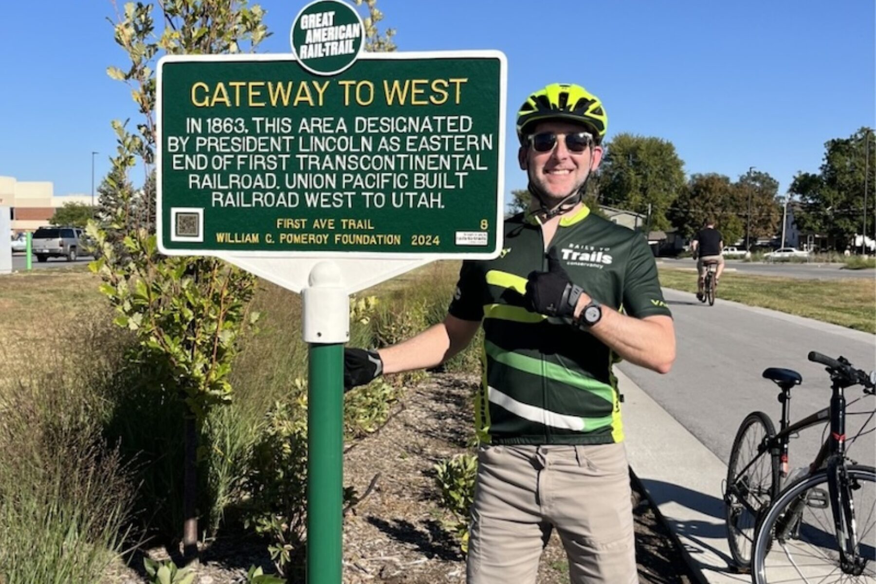 RTC's Kevin Belle at the First Ave Trail Great American Rail-Trail historical trail marker | Photo courtesy RTC