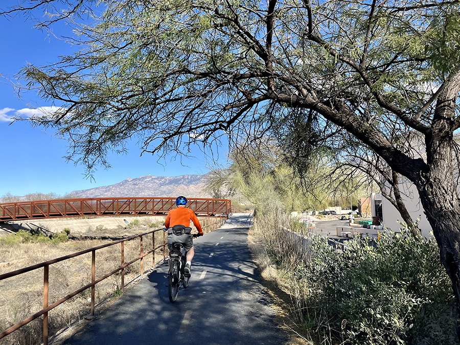 Views of the surrounding Santa Catalina Mountains serve as a backdrop along much of the Cañada del Oro River Park Trail in Oro Valley. The 11-mile route makes up one section of the Chuck Huckelberry Loop in Tucson. | Photo by Cindy Barks