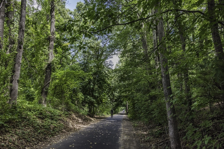 The 48-mile Farmington Canal Heritage Trail journeys through the heart of Connecticut, traversing lush forests and open farmland, connecting quaint New England towns, and offering glimpses of the past with historical canal locks. Photo by Bill Cannon.