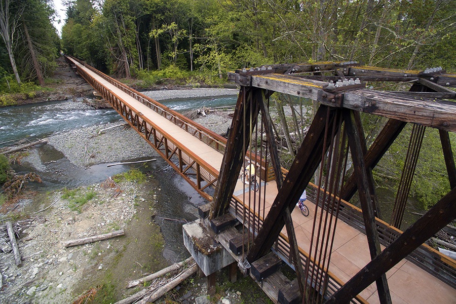 Bicyclist on the Dungeness River Bridge | Photo by John Gussman