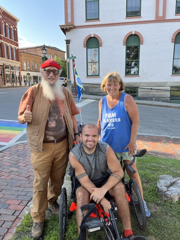 Monica and Jack Perme with Al Cohen (in the red hat), a businessman from Maine who gave $3,000 for a trike donation | Photo courtesy Monica Perme