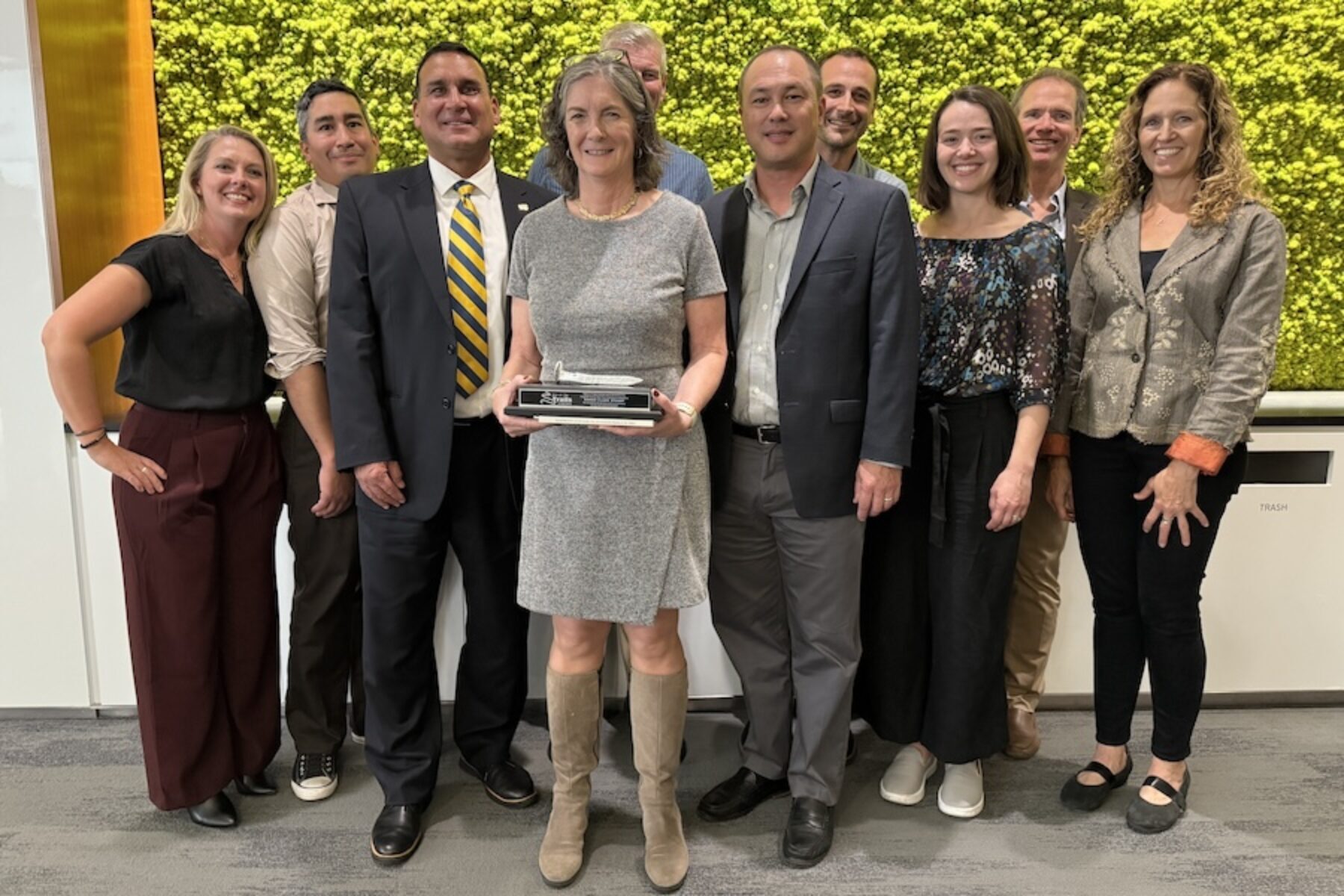 Clark at her October induction and (right) with Rails to Trails Conservancy staff and colleagues | Joe LaCroix, courtesy Rails to Trails Conservancy