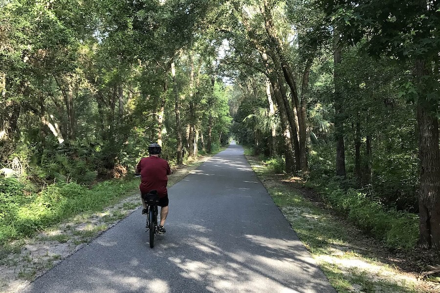 Bicyclists on Florida's East Central Regional Rail Trail | Photo by TrailLink user knitwitti