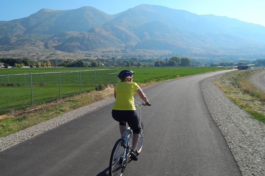 Bicyclist on Utah's Murdock Canal Trail | Photo by TrailLink user thejake91739