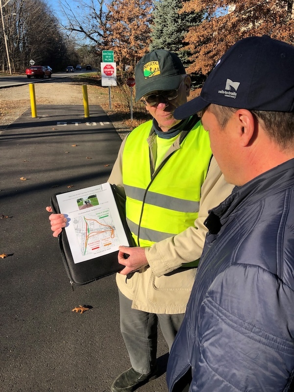 NH Rail Trails Coalition President Dave Topham and RTC President Ryan Chao review the proposed NHDOT designs for the Derry Rail Trail | Photo by Tom Sexton