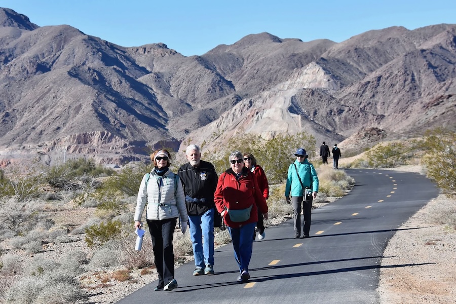Holly Pelking (far left) on a walk in Boulder City, Nevada, at the Bootleg Canyon Park and Trail. | Photo courtesy AVA, America's Walking Club