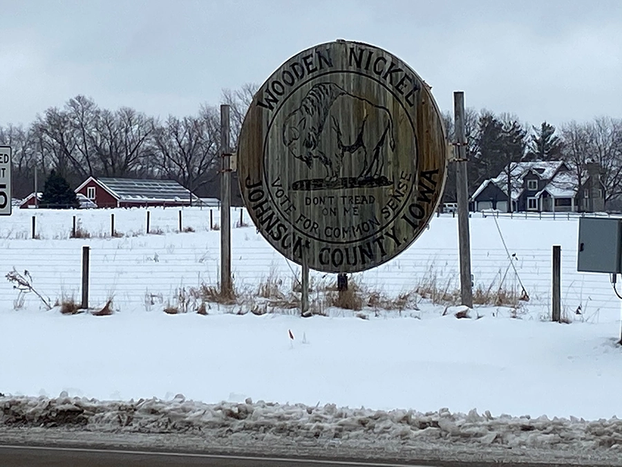 World's Largest Wooden Nickel along the Iowa River Corridor Trail in Iowa | Photo by Kevin Belanger