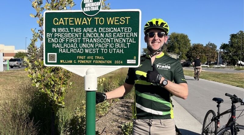 RTC's Kevin Belle at the First Ave Trail Great American Rail-Trail historical marker | Photo courtesy RTC