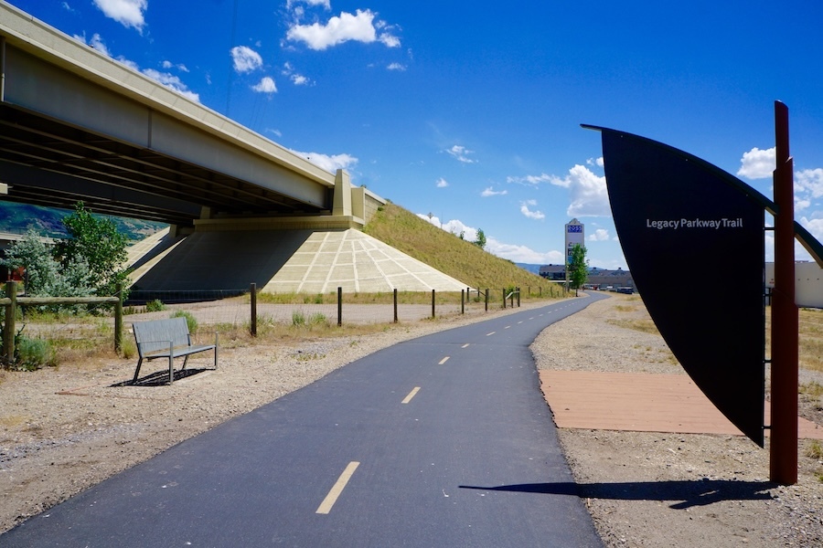 The Legacy Parkway Trail in the Salt Lake City, Utah, area passes through a variety of neighborhoods. In Farmington, it runs along a freeway and a railroad track, as well as a transit stop and a busy shopping area. | Photo by Cindy Barks The Legacy Parkway Trail in the Salt Lake City, Utah, area passes through a variety of neighborhoods. In Farmington, it runs along a freeway and a railroad track, as well as a transit stop and a busy shopping area. | Photo by Cindy Barks