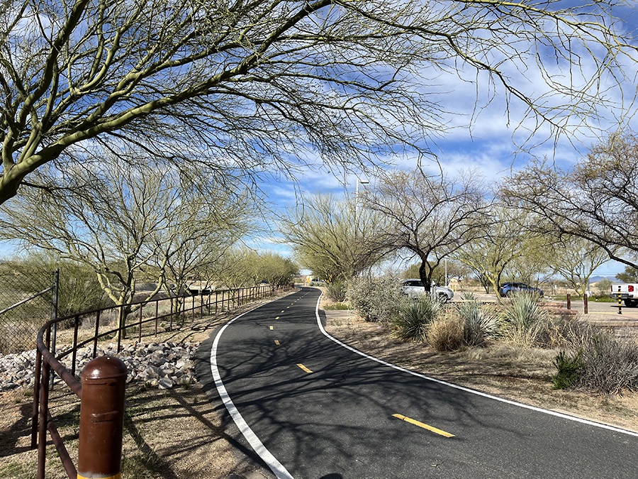 Desert landscaping lines the Julian Wash Greenway at the Roy Schoonover Trailhead, which was named after a longtime Pima County bicycling advocate. | Photo by Cindy Barks