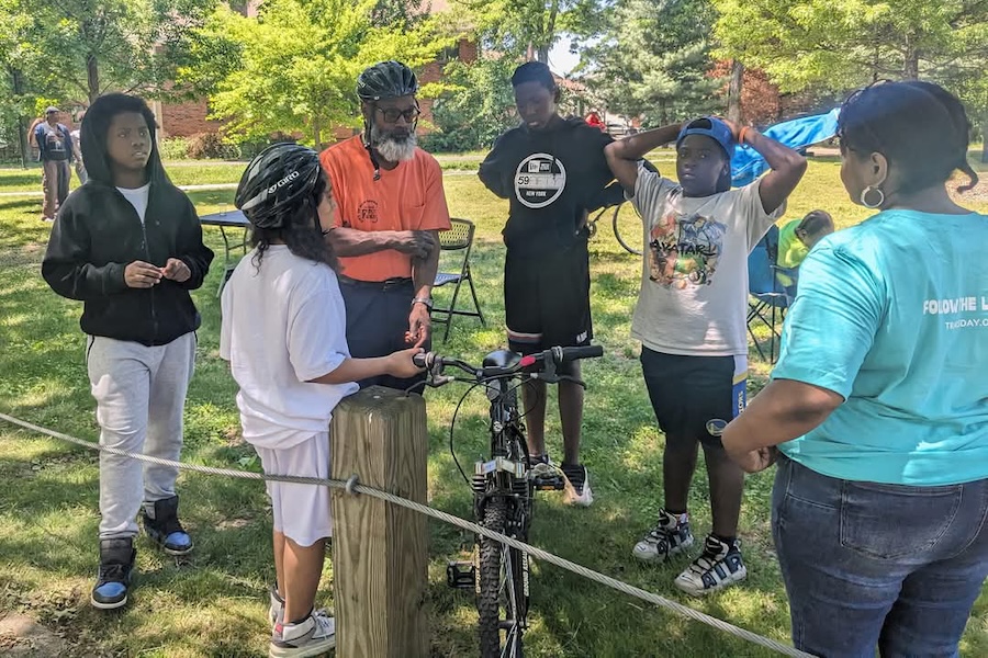 An introductory bicycle safety class for youth at the Newhallville Learning Corridor in the summer of 2024 | Photo courtesy New Haven Friends of the Farmington Canal Greenway