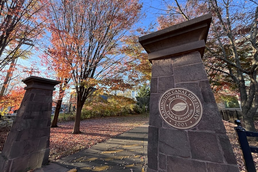 Farmington Canal Greenway trail signage near Yale | Photo by Cory Matteson