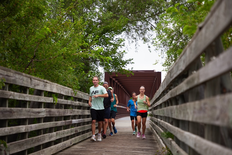 Runners on Nebraska's Cowboy Trail | Photo by Jonathan Egan