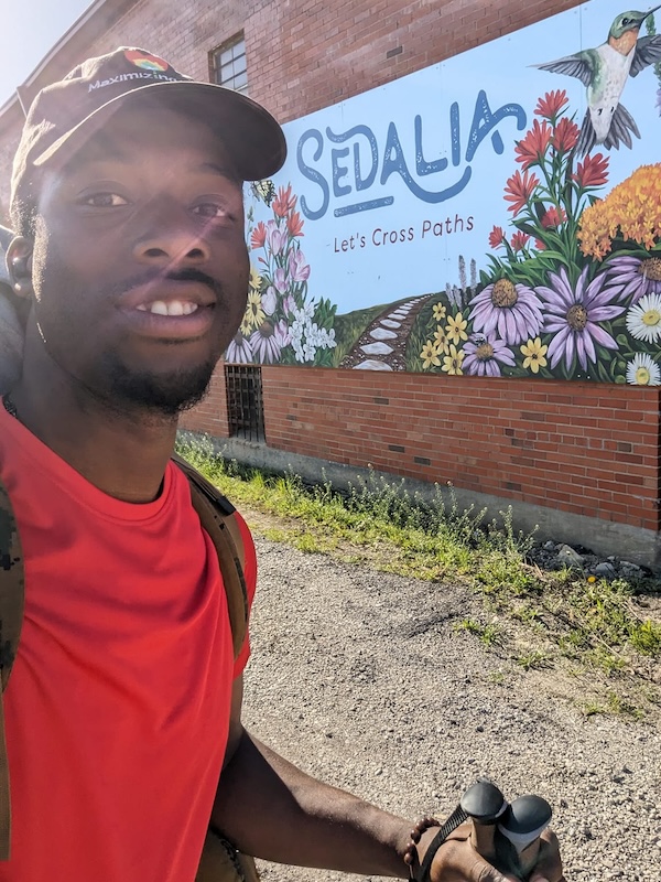 Isaiah Maxi at the Let's Cross Paths sign in Sedalia, Missouri | Photo courtesy Isaiah Maxi