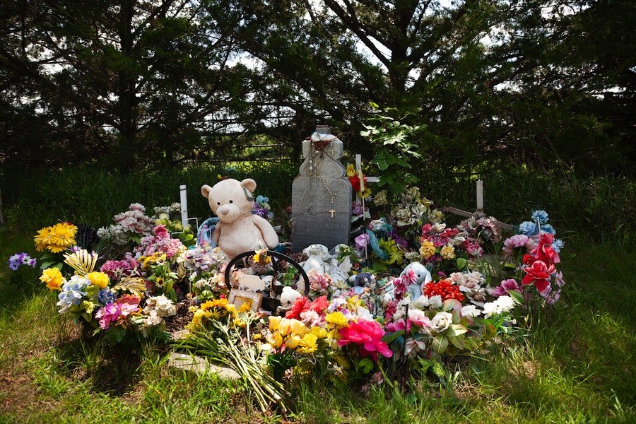 Laurel Hill Cemetery adorned with flowers and other offerings near Nebraska's Cowboy Trail | Photo by Jonathan Egan