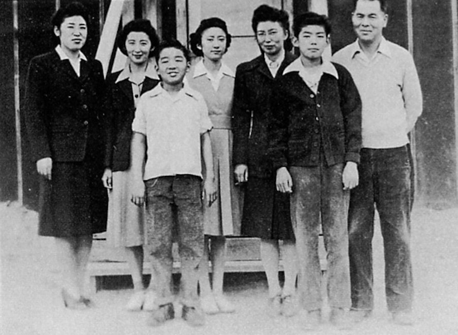 Sam, family in front of barrack | Photo courtesty Mihara Family Collection