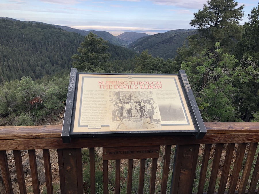 The railroad construction that took place in a section of steep terrain near Cloudcroft was described as &ldquo;slipping through the Devil&rsquo;s Elbow.&rdquo; Through the use of blasting, hand labor and draft animals, the railroad from Alamogordo to Cloudcroft was completed in less than two years. The overlook at the Devil&rsquo;s Elbow is one of the best spots to take in the views of the mountainous terrain along the Cloud-Climbing Trestle Trail. | Photo by Cindy Barks