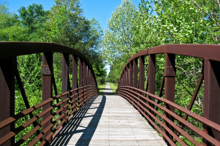 Nestled at the southern edge of the Appalachians, Alabama’s Chief Ladiga Trail connects a handful of quaint towns over its 33 paved miles through pastoral landscapes and Talladega National Forest. Photo by Tom Dulaney.
