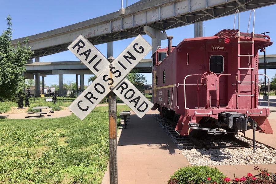 Located next to Kansas City&rsquo;s Freedom Mall is the Darby Trotter Spirit Mall&mdash;a spot that celebrates the city&rsquo;s &ldquo;bold, visionary spirit&rdquo; in the years after the Civil War, when the community became a railroad hub for the nation. The mall features a vintage train caboose. | Photo by Cindy Barks