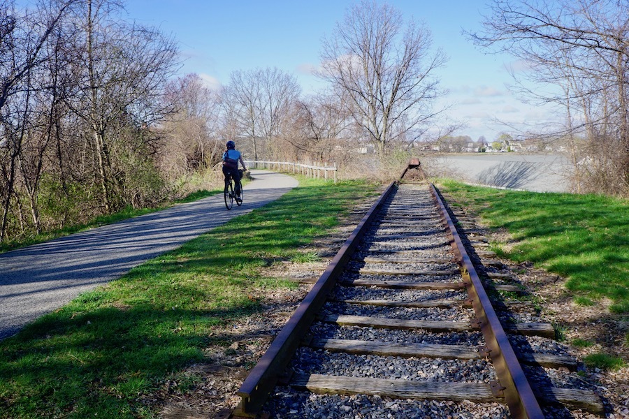 A short section of old railroad tracks along the South Portland Greenbelt commemorates the spot where the Portland Railroad and spur tracks once connected to a previous factory district. Photo by Cindy Barks.