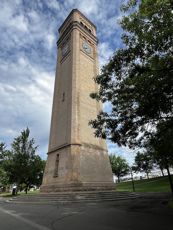 The 122-year-old Great Northern Clocktower, located in downtown Spokane&rsquo;s 100-acre Riverfront Park, is still hand-wound on a regular schedule. It marks the spot where the historic railroad depot once stood. Photo by Cindy Barks
