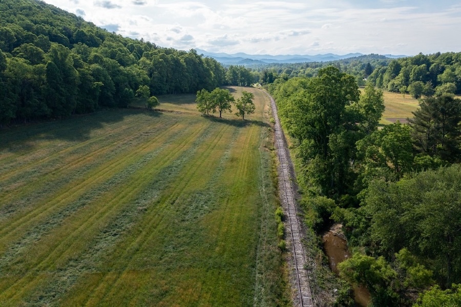 Aerial drone view of the railroad corridor that would become North Carolina's Ecusta Trail | Photo courtesy Friends of the Ecusta Trail