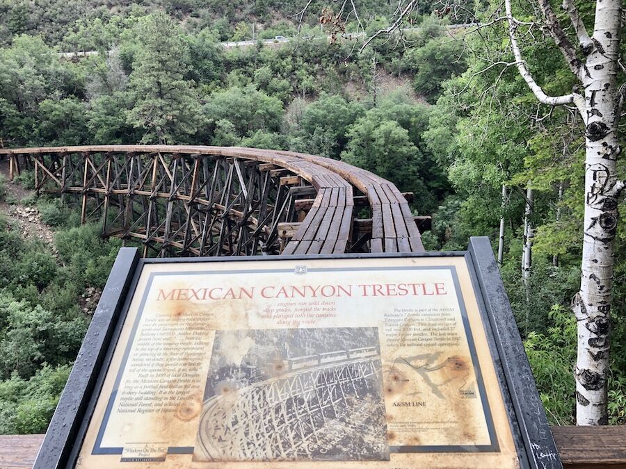 A sign at the base of the Cloud-Climbing Trestle notes that crossing the original structure was an unforgettable experience for passengers on the Alamogordo and Sacramento Mountain Railway (A&SM). Today, a network of trails takes hikers to the base of the trestle, but walking onto the trestle is prohibited. | Photo by Cindy Barks A sign at the base of the Cloud-Climbing Trestle notes that crossing the original structure was an unforgettable experience for passengers on the Alamogordo and Sacramento Mountain Railway (A&SM). Today, a network of trails takes hikers to the base of the trestle, but walking onto the trestle is prohibited. | Photo by Cindy Barks