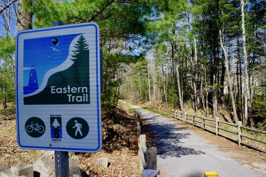 As the Eastern Trail continues south from the Scarborough/Saco/Old Orchard Beach area, it passes through dense stands of pine trees in the Arundel/Biddeford area, offering a sense of solitude. Photo by Cindy Barks. As the Eastern Trail continues south from the Scarborough/Saco/Old Orchard Beach area, it passes through dense stands of pine trees in the Arundel/Biddeford area, offering a sense of solitude. Photo by Cindy Barks.