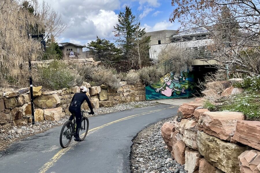 13_Utah's Poison Creek Trail in Park City_Photo by Cindy Barks A cyclist rides a paved section of the connecting Poison Creek Trail that runs through Park City’s Main Street area. Photo by Cindy Barks.