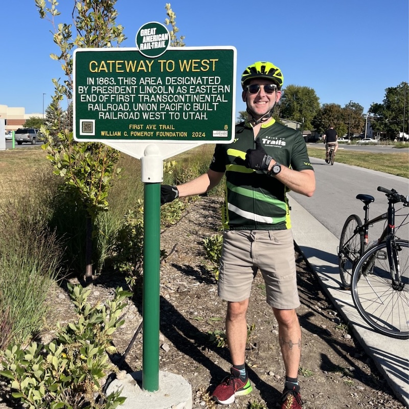 RTC's Kevin Belle at the First Ave Trail Great American Rail-Trail historical trail marker | Photo courtesy RTC