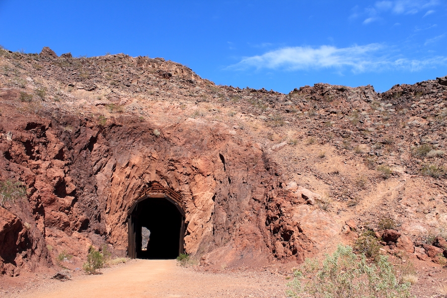 Although less than 4 miles, Nevada’s Historic Railroad Trail is a worthwhile adventure offering panoramic views of Lake Mead and passage through five railroad tunnels on its way toward Hoover Dam. Photo courtesy Eric Arnold Photography.