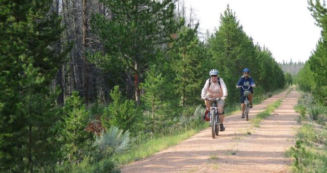 Wyoming’s Medicine Bow Rail Trail passes through large stands of lodgepole, spruce, fir and aspen; traverses meadows of grass and sagebrush; crosses numerous streams; and skirts dozens of swamps, bogs, ponds and lakes. Photo by Amber Travsky.