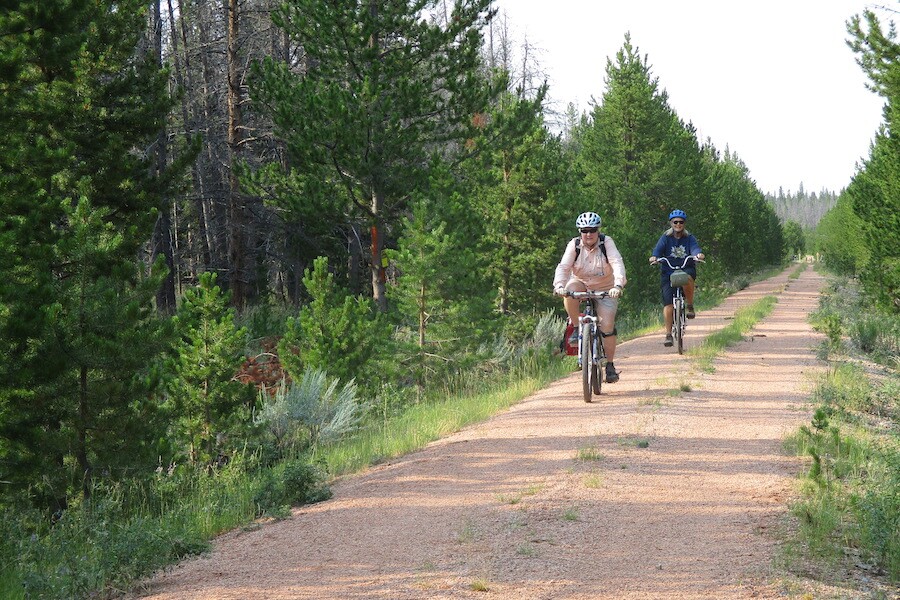 Wyoming’s Medicine Bow Rail Trail passes through large stands of lodgepole, spruce, fir and aspen; traverses meadows of grass and sagebrush; crosses numerous streams; and skirts dozens of swamps, bogs, ponds and lakes. Photo by Amber Travsky.