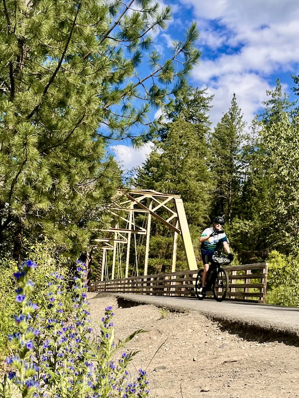 A popular spot along the Spokane River Centennial State Park Trail is the bridge crossing over Deep Creek as it flows into the Spokane River. Photo by Cindy Barks