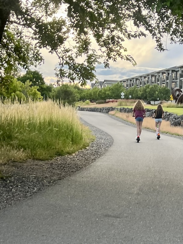 Scooters are available for rent at multiple sites in downtown Spokane and are allowed on the Spokane River trail, as are skateboards and pedal-assist e-bikes. Photo by Cindy Barks