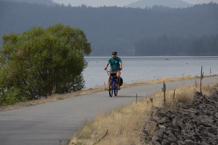 Bicyclist on Idaho's Trail of the Coeur d'Alenes | Photo by Glenn Zinkus