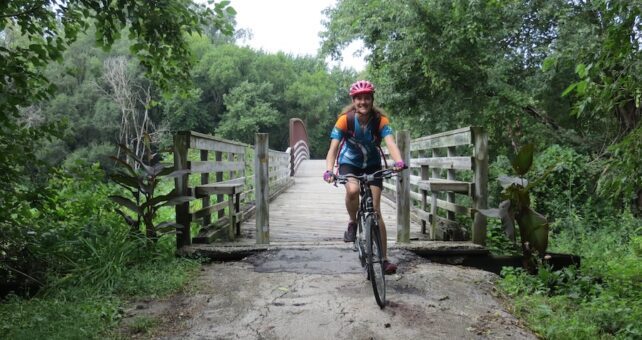 Bicyclist on Wabash Trace Nature Trail near Imogene, Iowa | Photo by Laura Stark