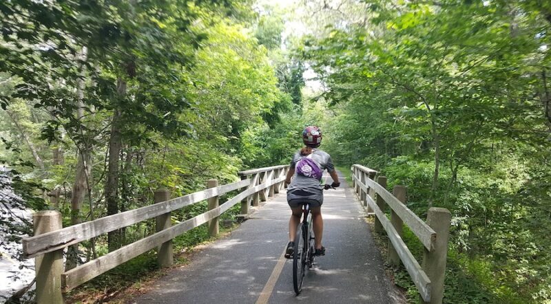 Bicyclist on Massachusetts' Shining Sea Bikeway | Photo by Leeann Sinpatanasakul