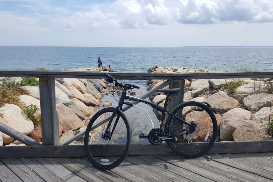 Stopping near water on Massachusetts' Shining Sea Bikeway | Photo by Leeann Sinpatanasakul