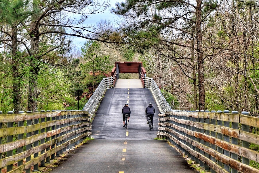 Bicyclists on bridge along Georgia's Silver Comet Trail bridge | Photo by Dave Jonasen