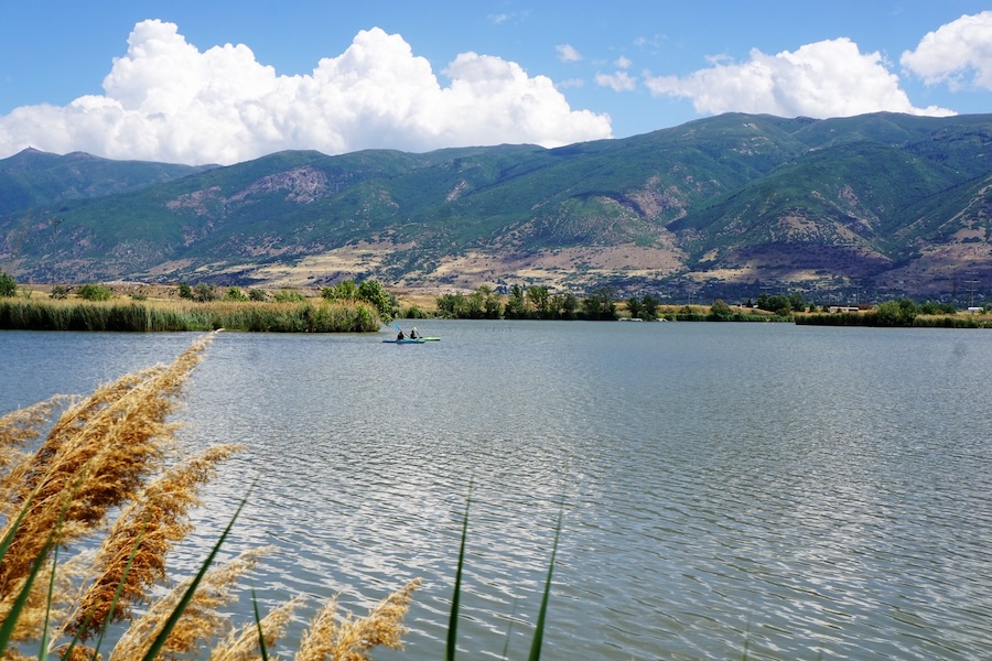 The Bountiful Pond, just off the Legacy Parkway Trail in West Bountiful, is bordered by foliage and walking trails. | Photo by Cindy Barks
