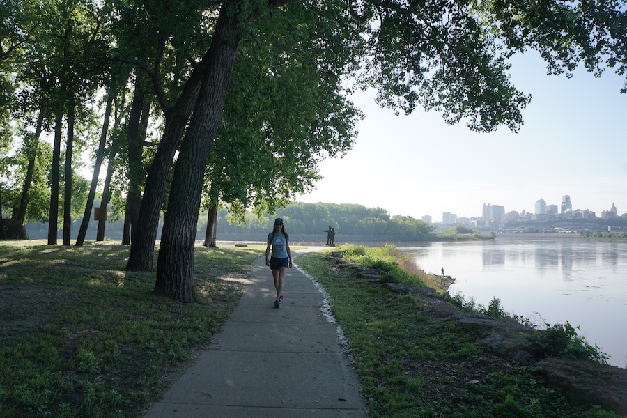 Lisa Peña, the founder of Urban Hikes Kansas City, walks along a section of the Riverfront Heritage Trail at Kaw Point in Kansas City, Kansas. | Photo by Cindy Barks