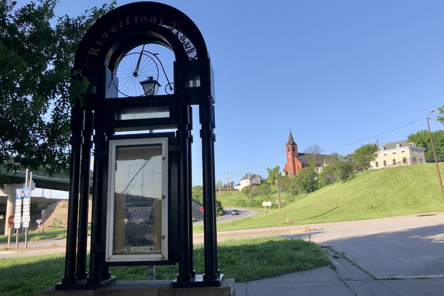 Located on the bluffs overlooking the confluence of the Kansas and Missouri rivers, the Strawberry Hill neighborhood borders a section of the Riverfront Heritage Trail in Kansas City, Kansas. The area has been home to immigrants from Croatia, Slovenia, Serbia and Russia. Churches, such as the St. John the Baptist Catholic Ethnic Croatian Parish on the hill, were started by those immigrant communities and remain today. | Photo by Cindy Barks