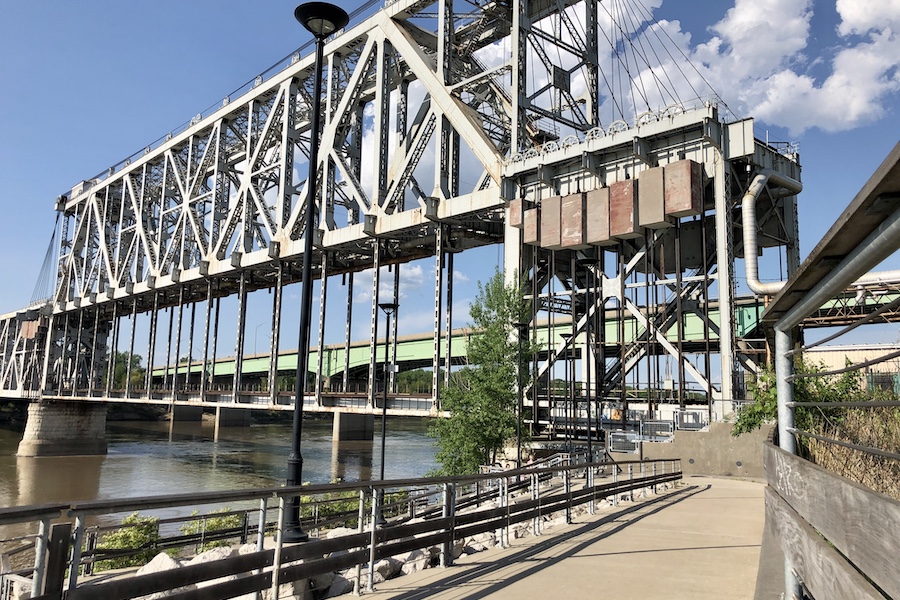 The ASB (Armour-Swift-Burlington Bridge) is a railroad crossing that once also carried vehicular traffic until the Heart of America Bridge opened to the east in the 1980s, replacing the vehicular portion. The Riverfront Heritage Trail passes under the bridge. | Photo by Cindy Barks