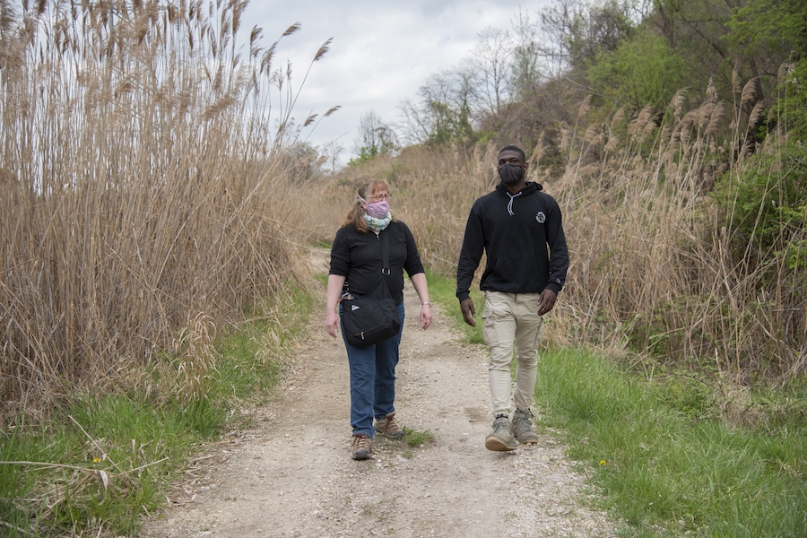 Patty Dowd and Ethan Abbott walk on the BGE Utility Corridor, a critical gap of future trail | Photo by Arielle Bader