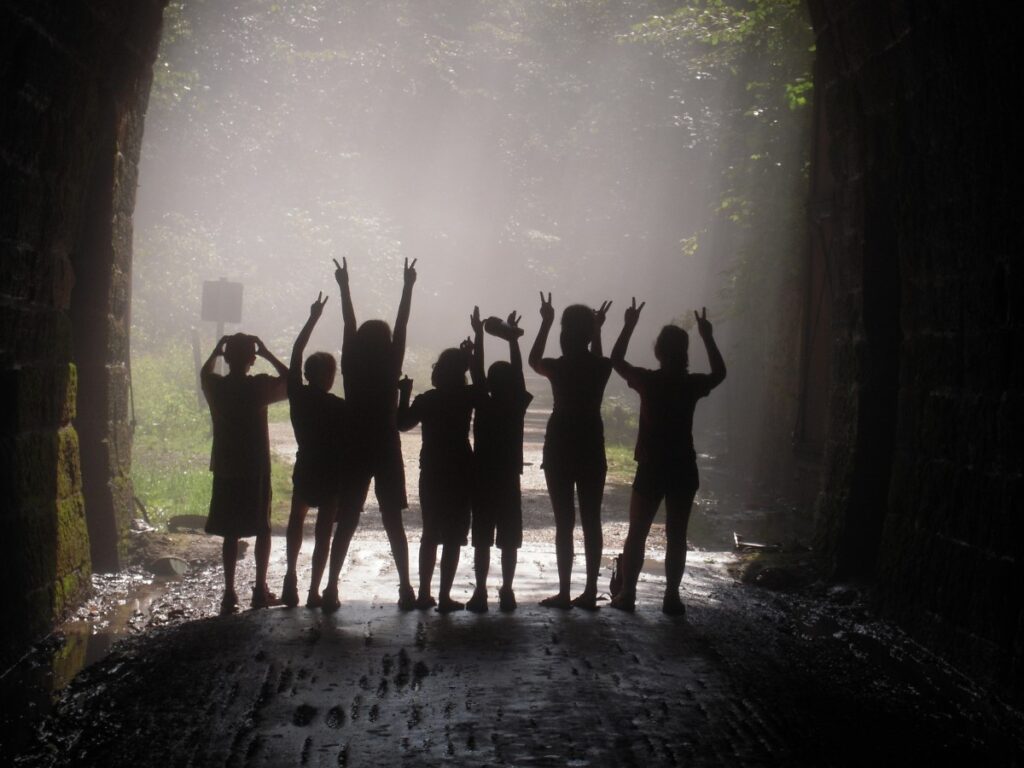 A photo taken several years ago of children along Wisconsin’s Elroy-Sparta State Trail, one of the earliest major rail-trail conversions in the United States. | Courtesy Wisconsin Department of Natural Resources
