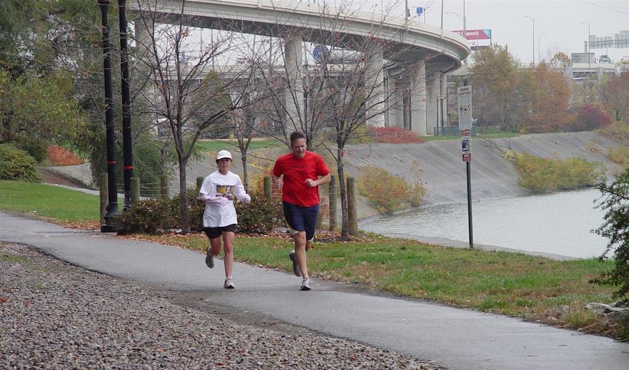 People jogging along the Louisville Loop Riverwalk | Courtesy of Louisville Parks and Recreation