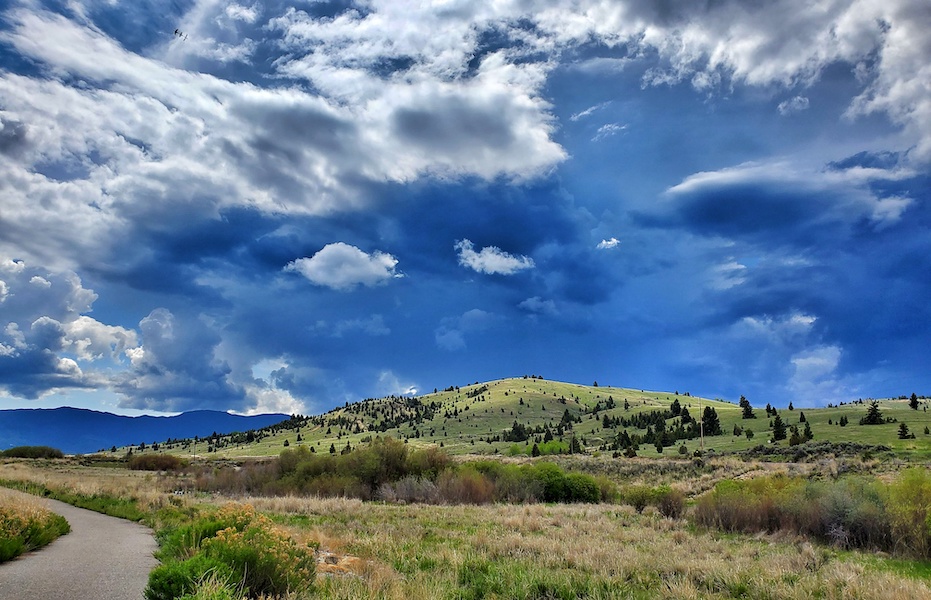 View of Bluebird Hill along the Silver Bow Greenway Trail near Butte between the Whiskey Gulch and Rocker Stations | Photo by Richard I. Gibson